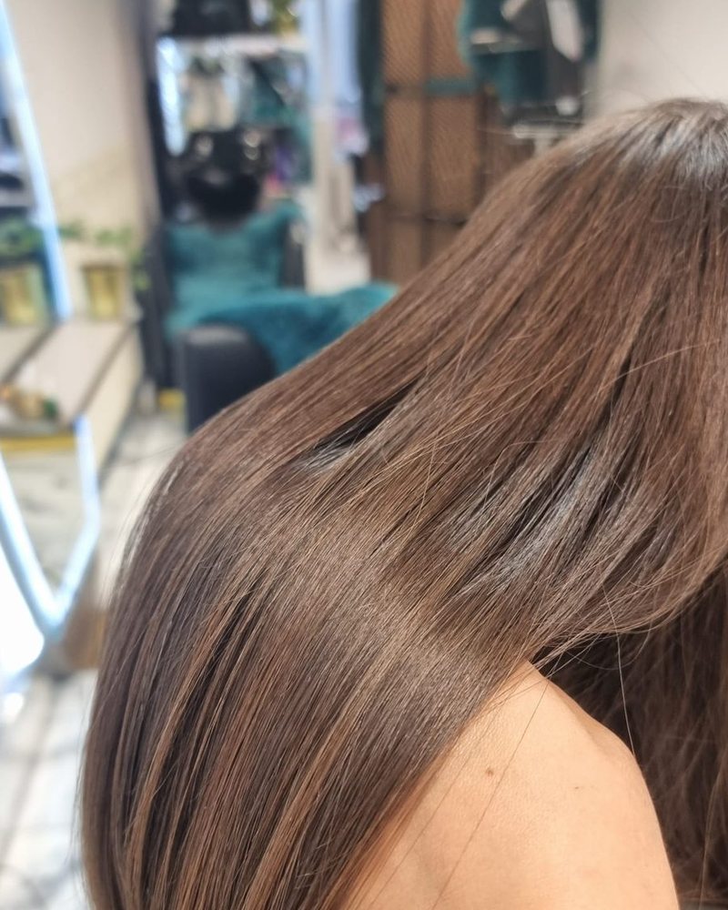 Close-up of a smooth, glossy keratin treatment finish